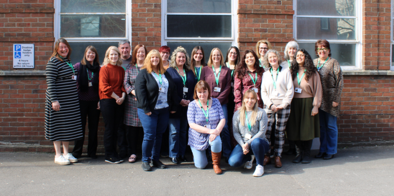 two women walking along street