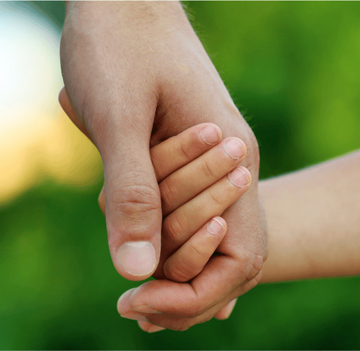 parent and child holding hands